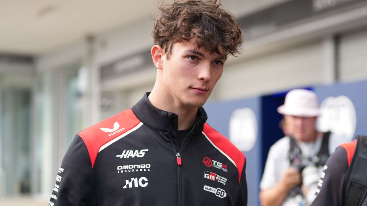 Haas driver Oliver Bearman of Britain walks down pit lane following his crash during the Japanese Formula One Grand Prix at Suzuka in central Japan, Sunday, March 29, 2026.