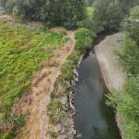 Dozens of old cars, debris pulled from Logan River in restoration project