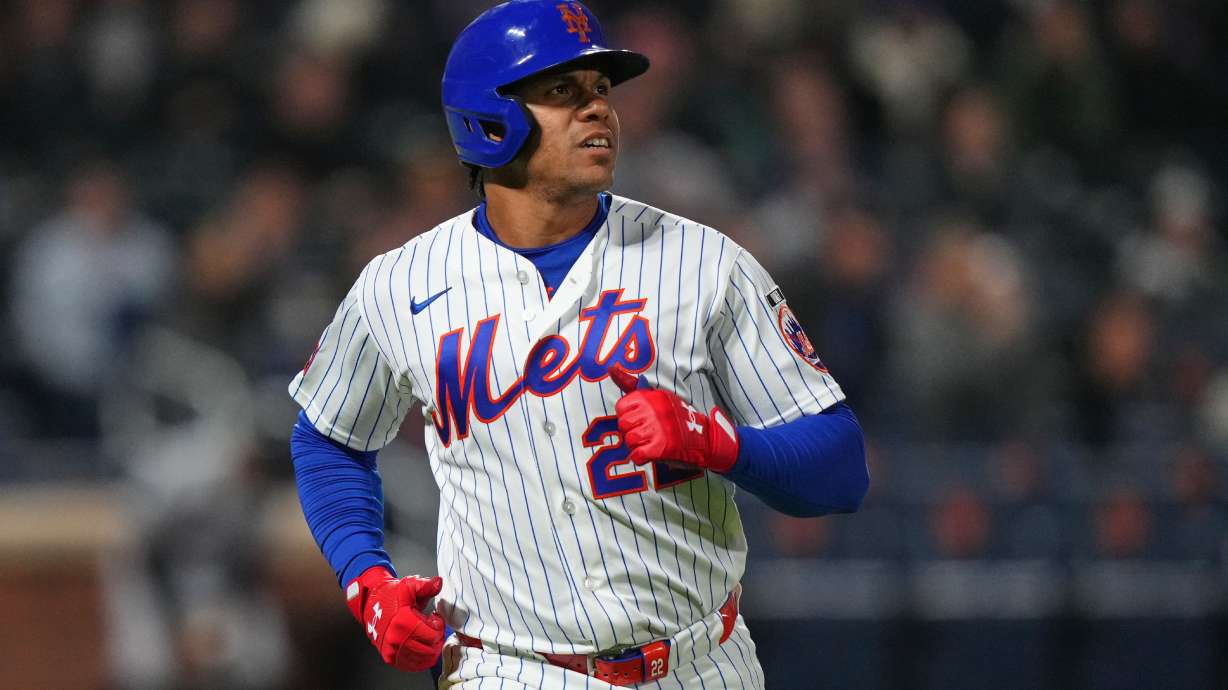 New York Mets' Juan Soto reacts after hitting a line out during the third inning of a baseball game against the Minnesota Twins Wednesday, April 22, 2026, in New York.