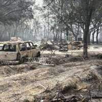 Southern US wildfires force residents to flee, leaving them unsure if their homes are standing