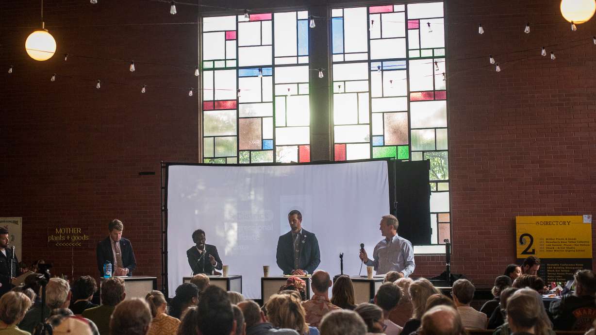 Left to right, Democrats Nate Blouin, Liban Mohamed, Michael Farrell and Ben McAdams debate each other for Utah’s 1st Congressional District at Church & State in Salt Lake City, Wednesday.