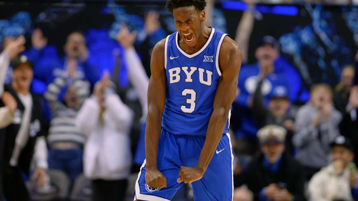 FILE - BYU forward AJ Dybantsa reacts to scoring a career high and new freshman record at BYU during the second half of an NCAA college basketball game against Utah, Saturday, Jan. 24, 2026, in Provo, Utah.