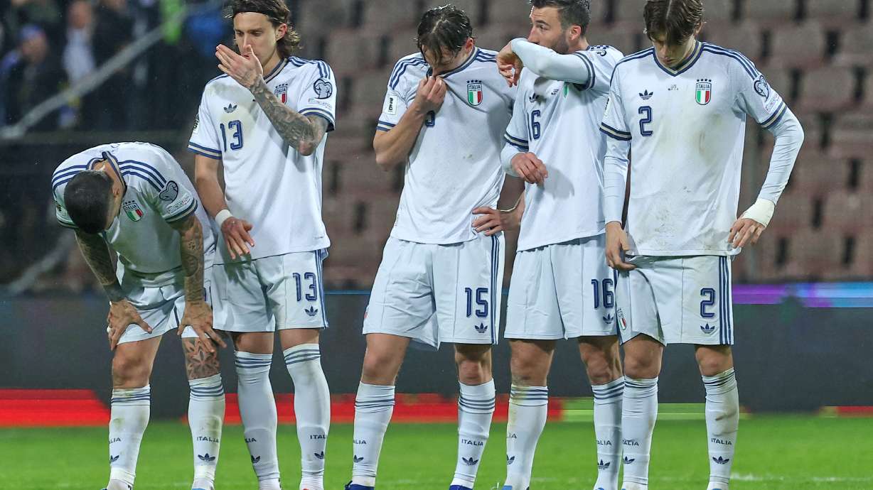 Italy players react during a penalty shootout during the World Cup qualifying playoff final soccer match between Bosnia and Italy in Zenica, Bosnia, Tuesday, March 31, 2026.