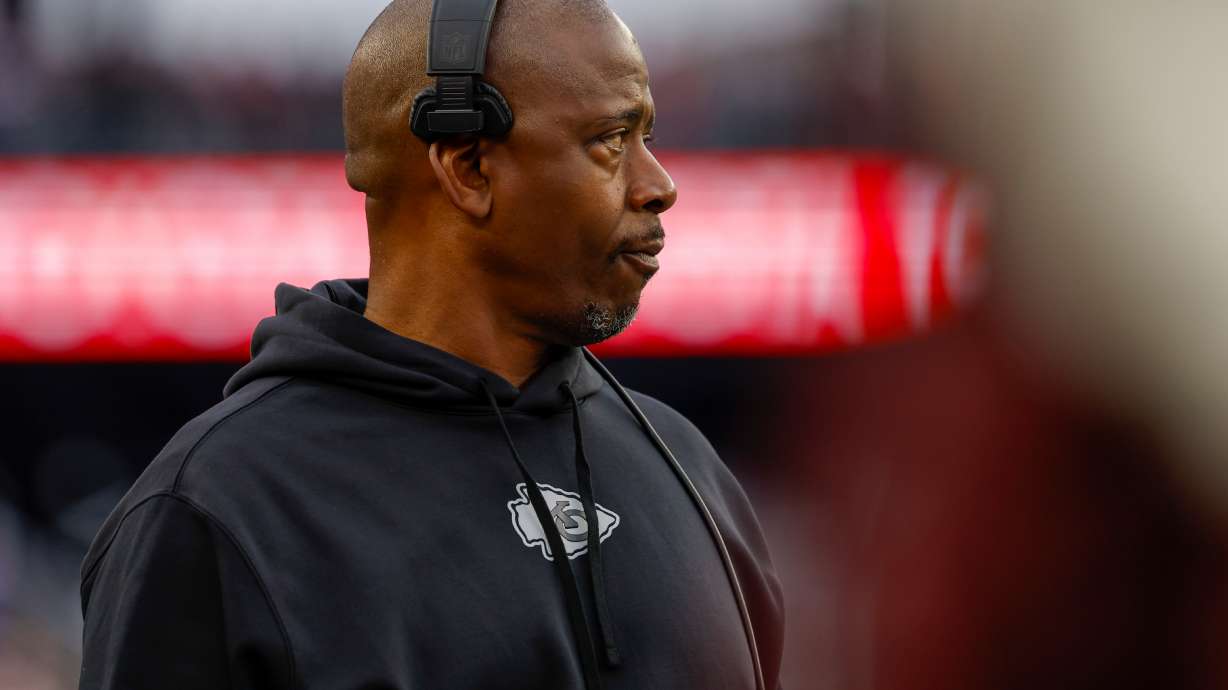 FILE - Kansas City Chiefs defensive backs coach Dave Merritt stands on the sideline during the first half of an NFL football game against the New England Patriots, Dec. 17, 2023, in Foxborough, Mass.