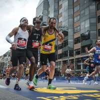 Man who helped runner across Boston Marathon finish line says it was natural instinct
