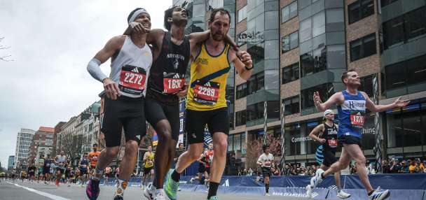 Man who helped fellow runner across Boston Marathon finish line says it was natural instinct to help