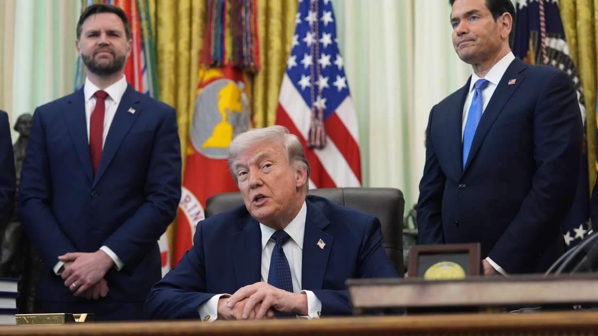 President Donald Trump speaks as Secretary of State Marco Rubio and Vice President JD Vance listen in the Oval Office at the White House, Thursday, in Washington. Trump announced an extension of the ceasefire in Lebanon.