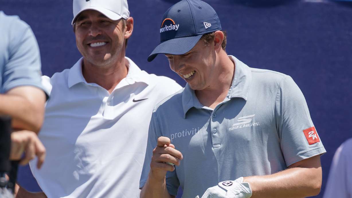 Brooks Koepka and Matt Fitzpatrick, of England, talk before teeing off on the first hole during the first round of the PGA Zurich Classic golf tournament, Thursday, April 23, 2026, in Avondale, La.