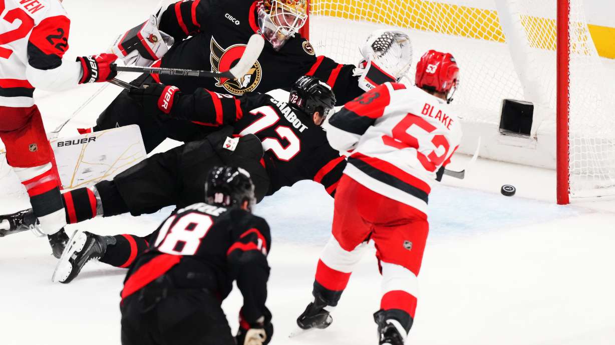 Carolina Hurricanes' Jackson Blake (53) scores on Ottawa Senators goaltender Linus Ullmark (35) as Senator's Thomas Chabot (72) defends during the second period of an NHL hockey playoff game in Ottawa, Ontario, Thursday, April 23, 2026.