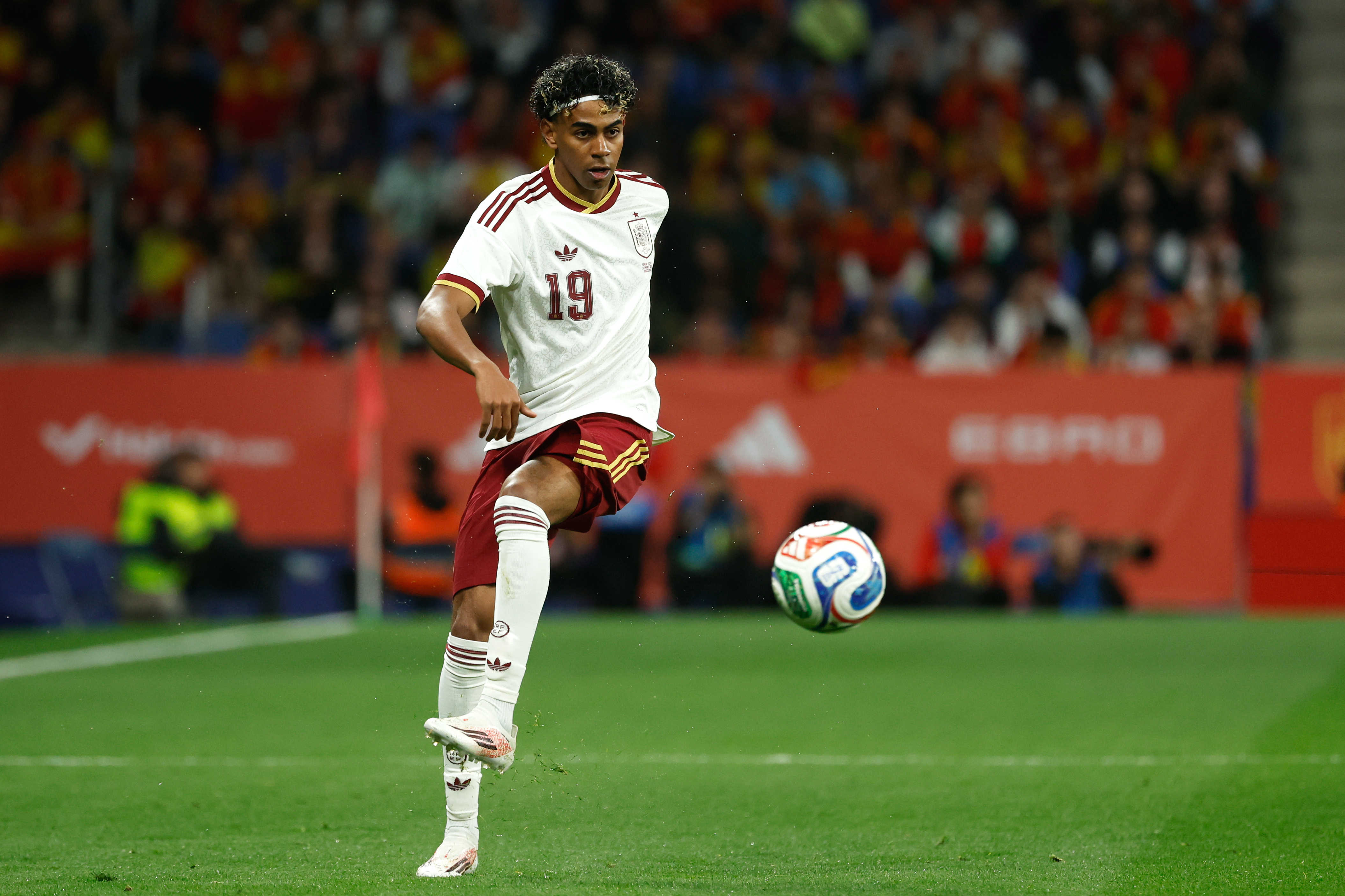 FILE - Spain's Lamine Yamal controls the ball during the international friendly soccer match between Spain and Egypt in Barcelona, Spain, March 31, 2026. 
