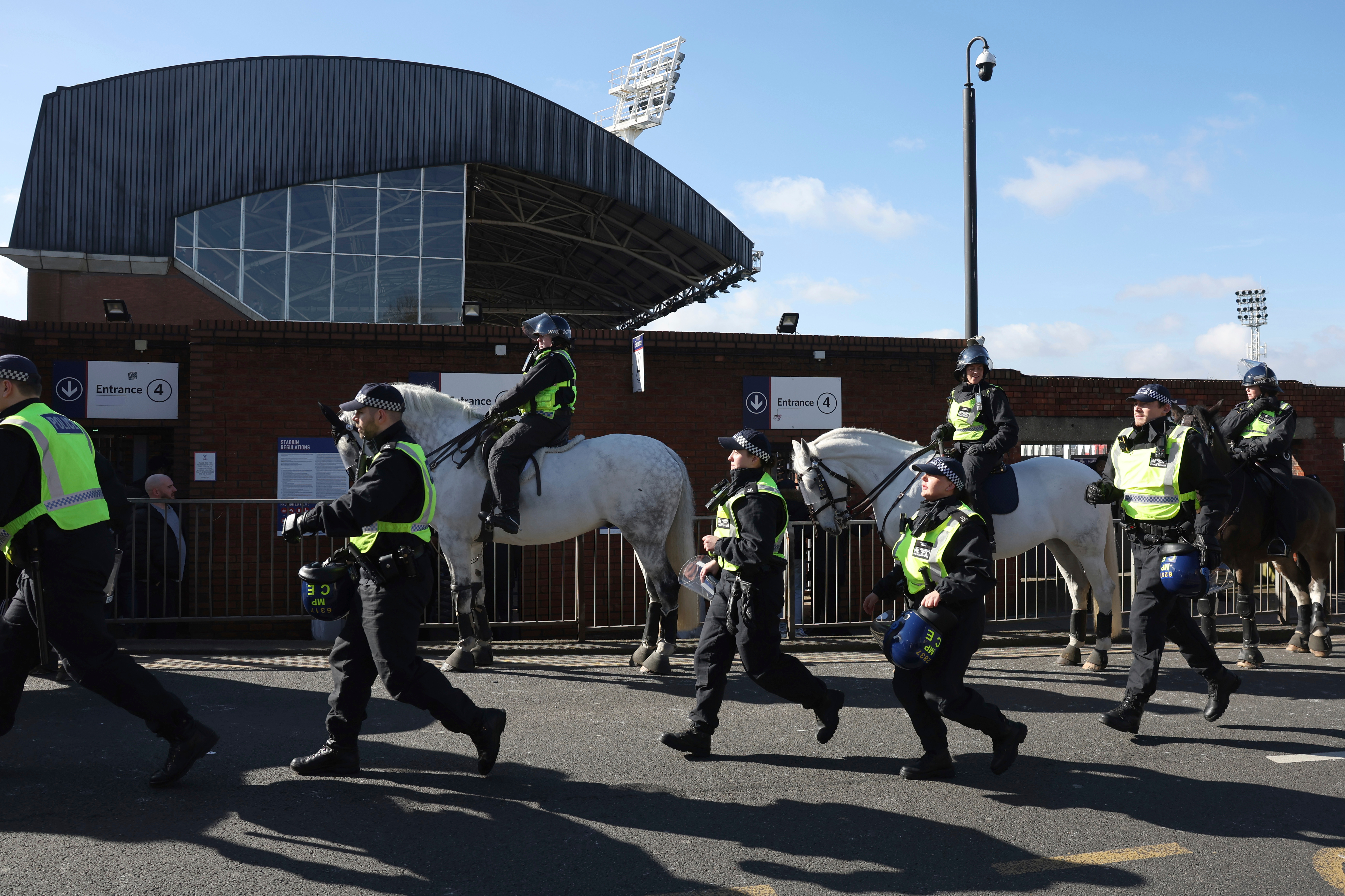 Millwall fumes after anti-racism booklet shows its badge on a Ku Klux Klan robe