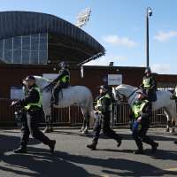Millwall fumes after anti-racism booklet shows club's logo on a Ku Klux Klan robe