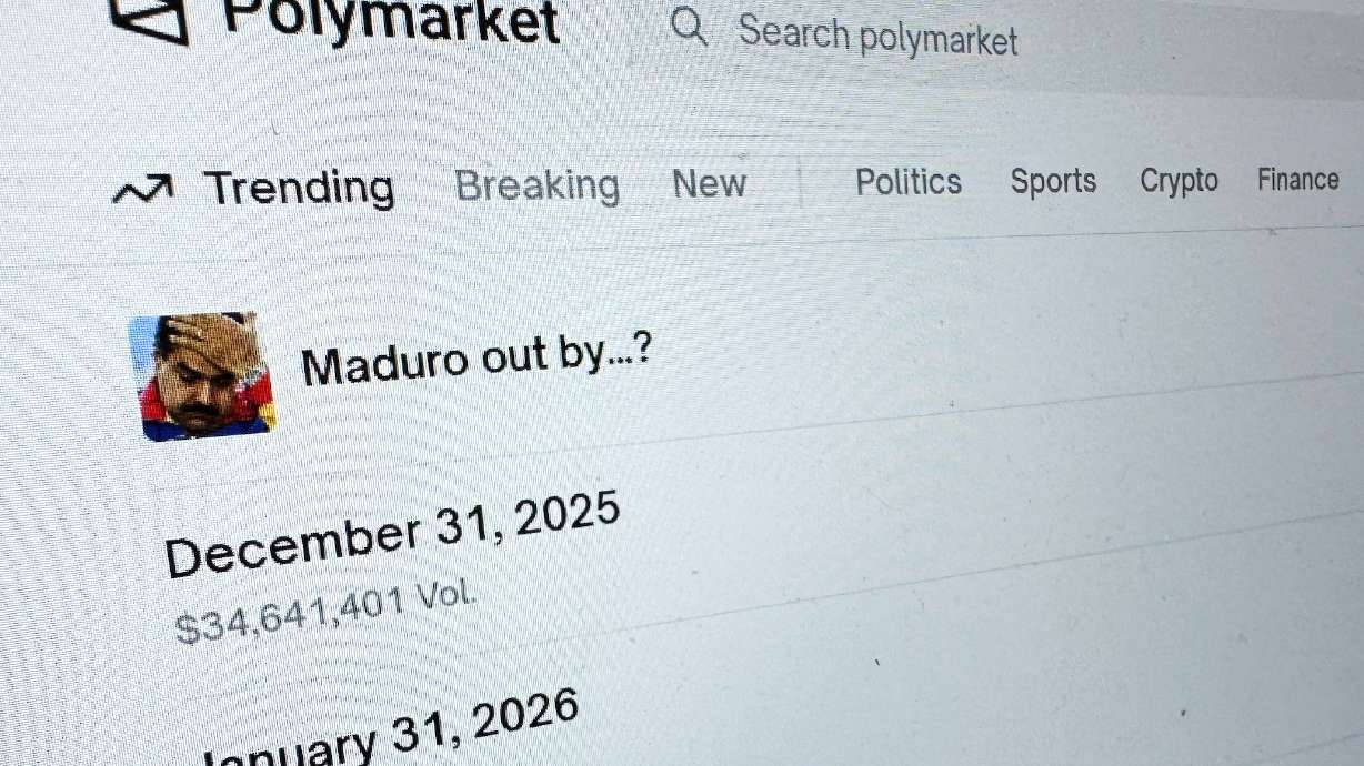 FILE - The Polymarket prediction market website is displayed on a computer screen, Jan. 11, 2026, in New York.