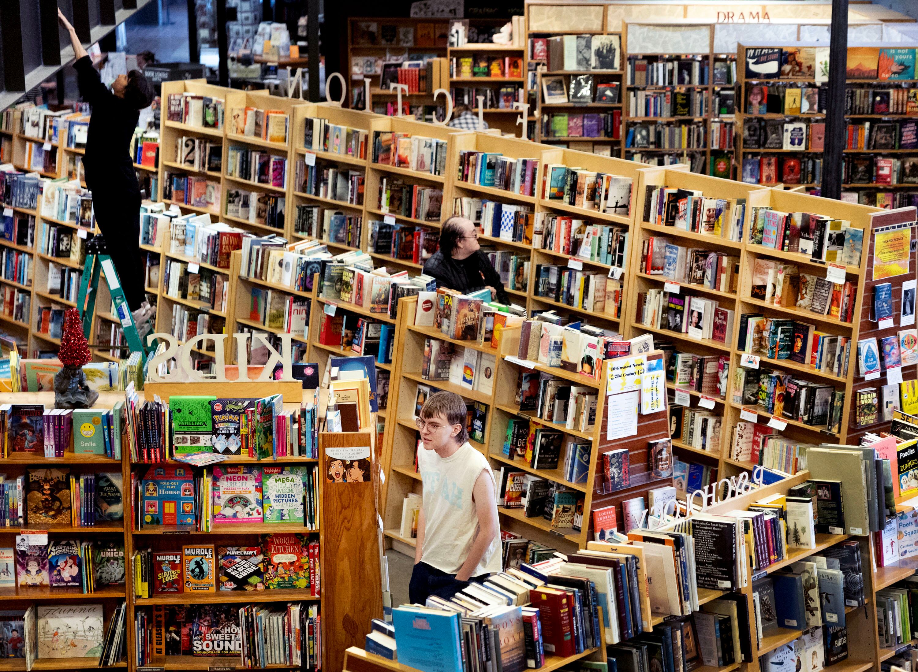 People shop at Weller Book Works in Salt Lake City on Wednesday.