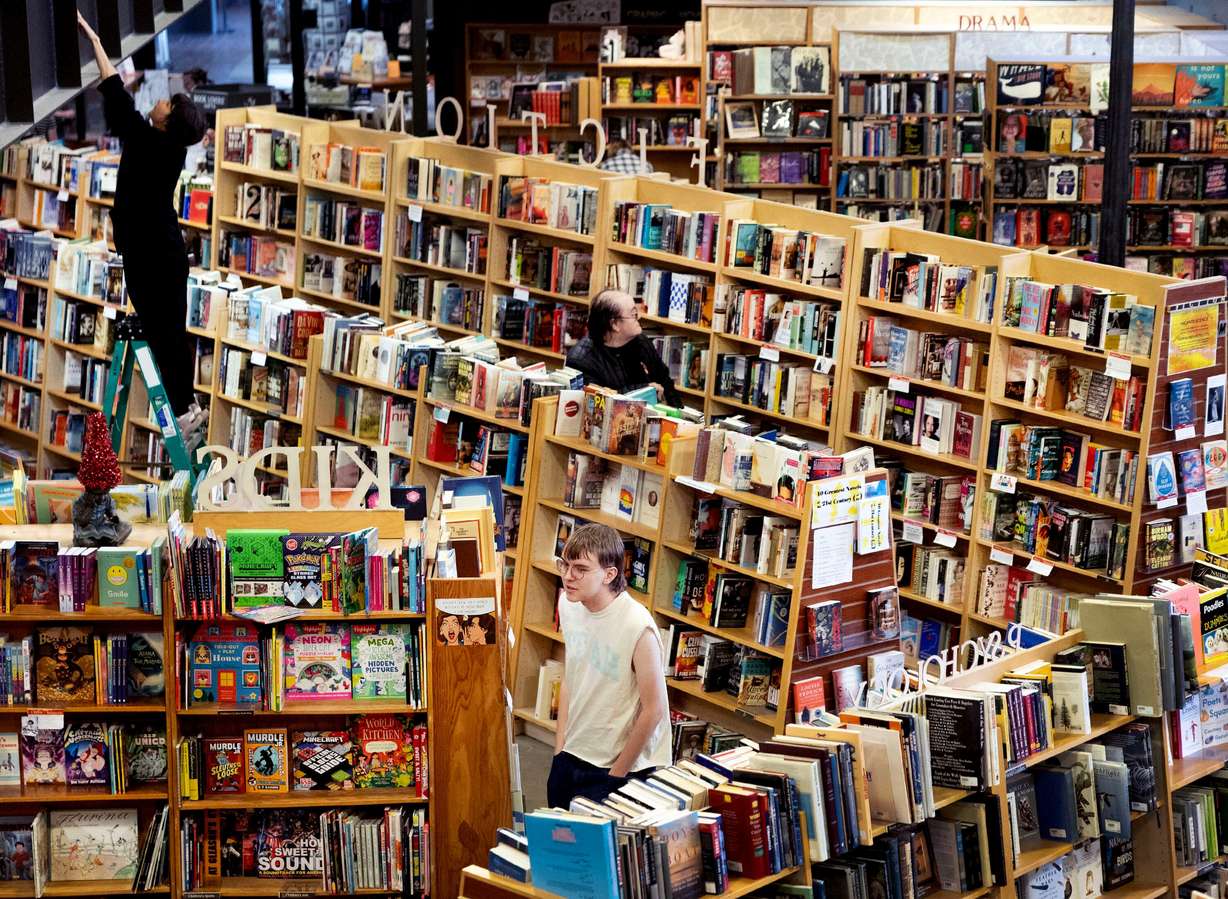 People shop at Weller Book Works in Salt Lake City on Wednesday.