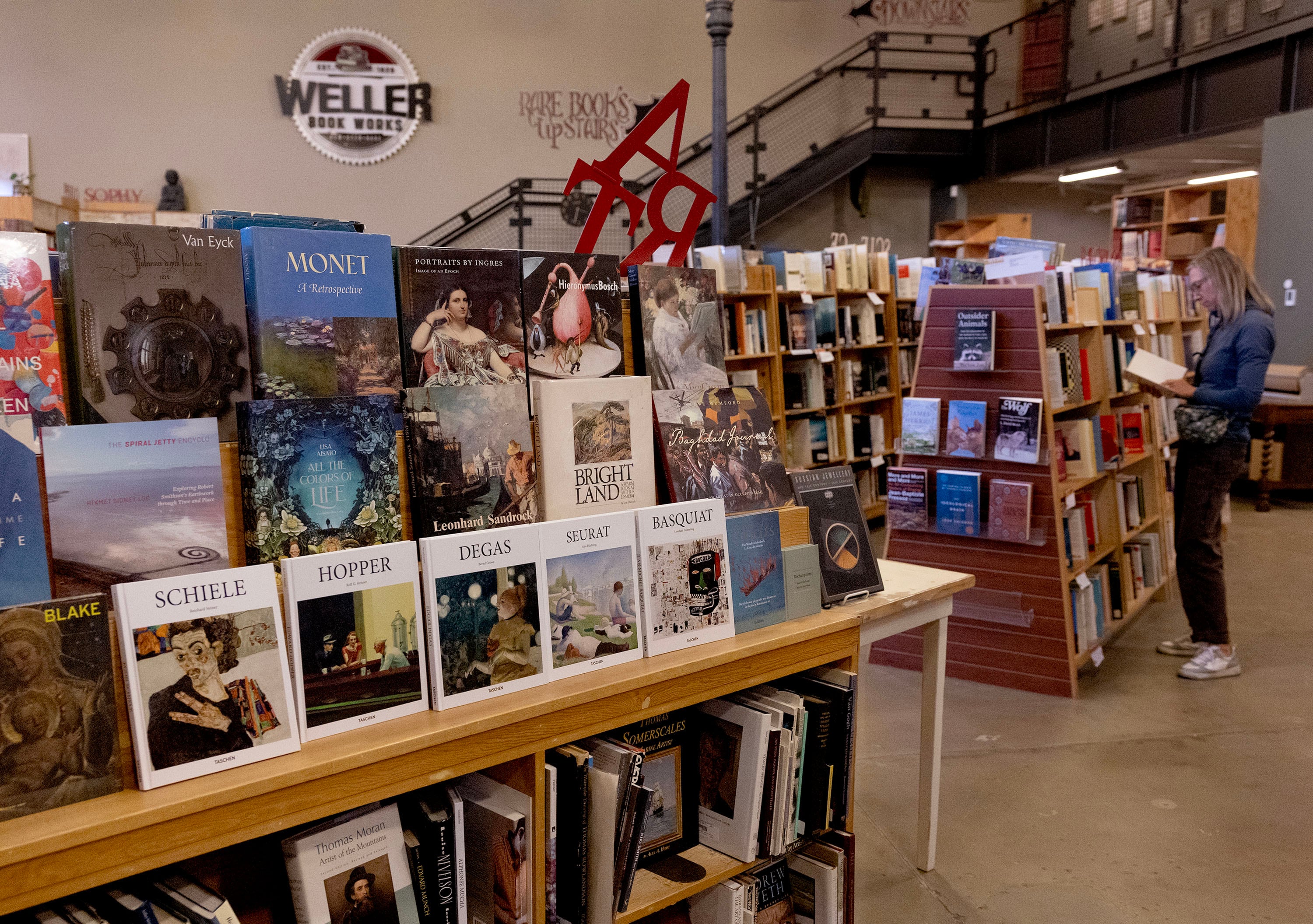 People shop at Weller Book Works in Salt Lake City on Wednesday.