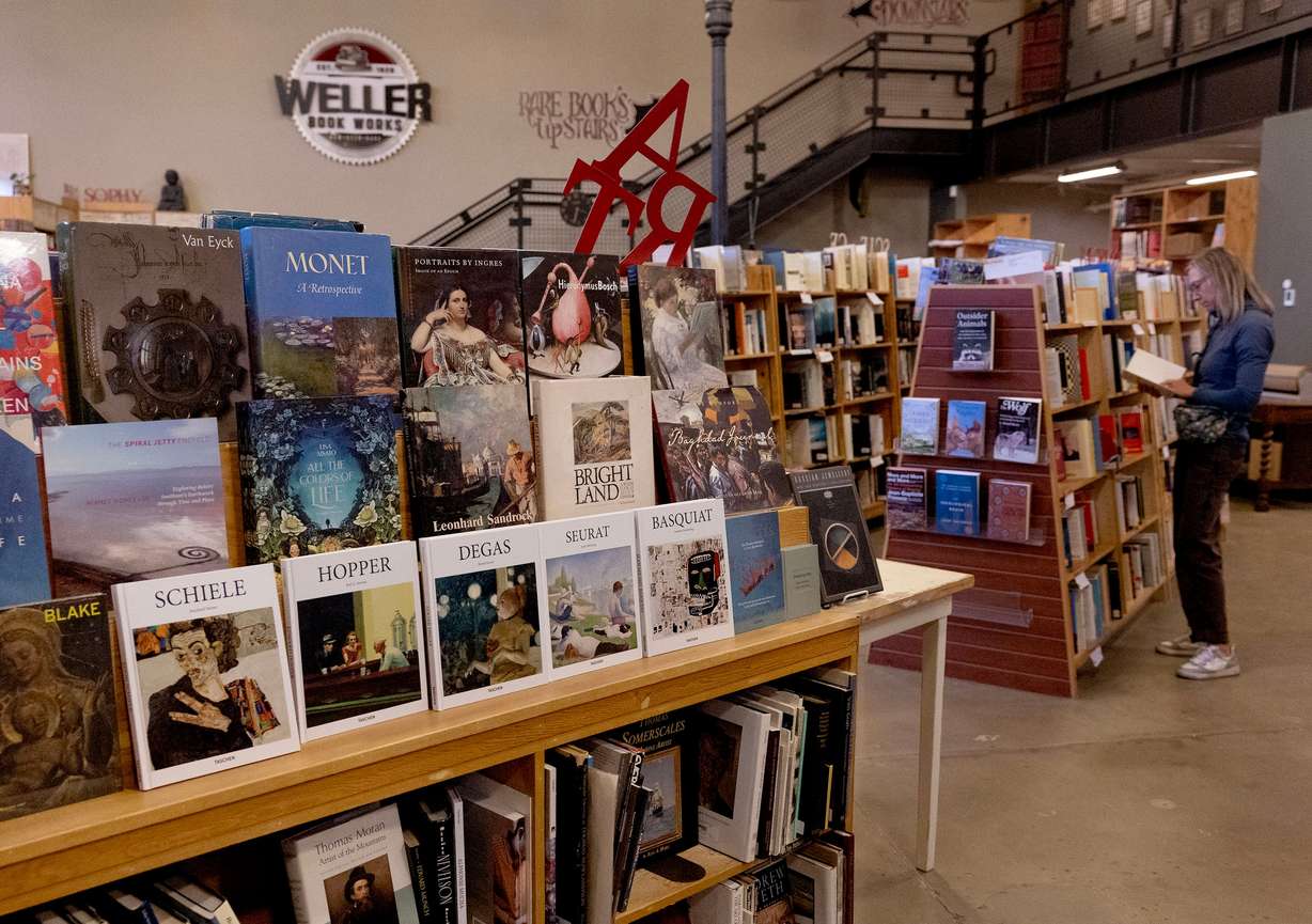 People shop at Weller Book Works in Salt Lake City on Wednesday.