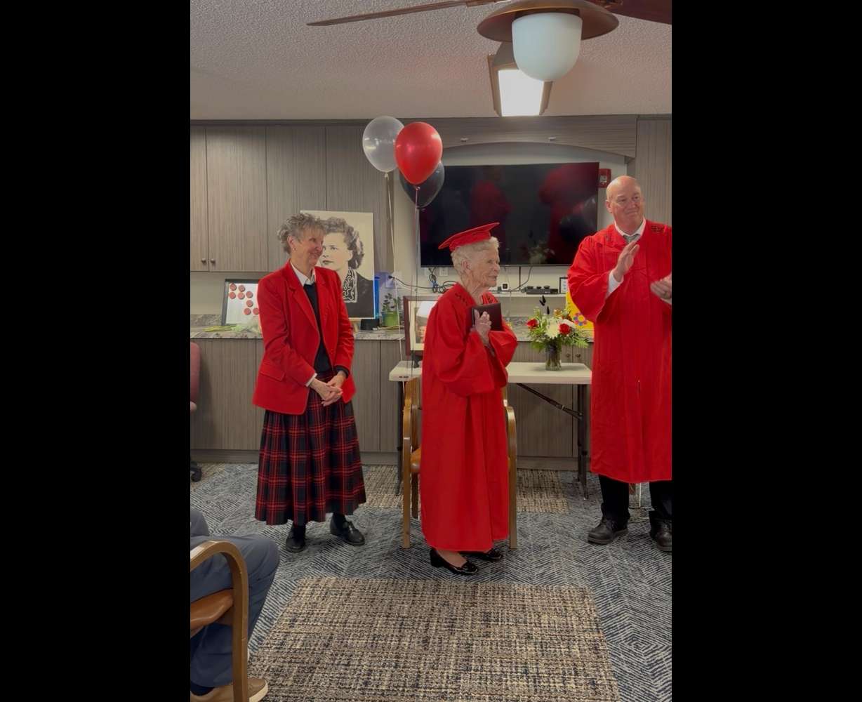 Norma Parker, of Idaho Falls, receives a high school diploma on April 9 more than 80 years after she left high school early. Superintendent Brandon Ferris and school board member Julianne Hill presented her with the diploma.