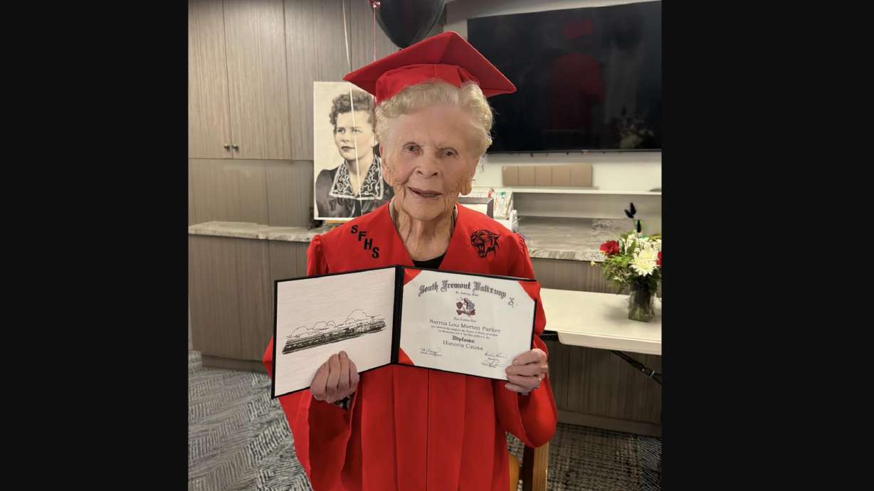 Norma Parker, of Idaho Falls, receives a high school diploma on April 9 more than 80 years after she left high school early.