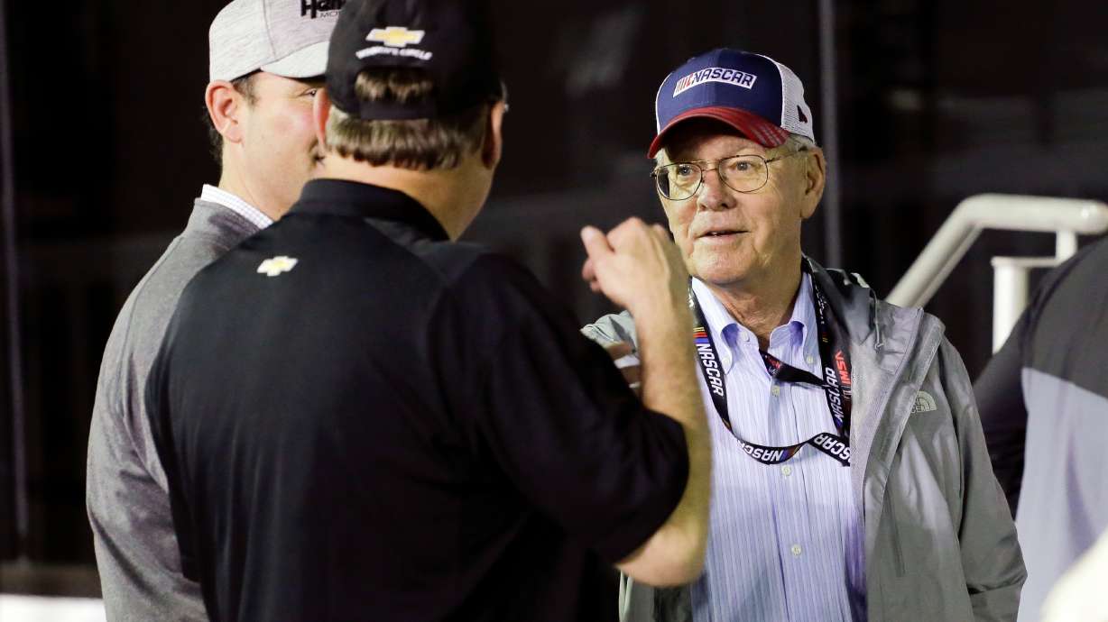 FILE - Jim France, right, chairman and executive vice president of NASCAR, talks with sponsors in Victory Lance after the second of two NASCAR Daytona 500 qualifying auto races at Daytona International Speedway, Thursday, Feb. 13, 2020, in Daytona Beach, Fla. (AP Photo/Terry Renna, File_
