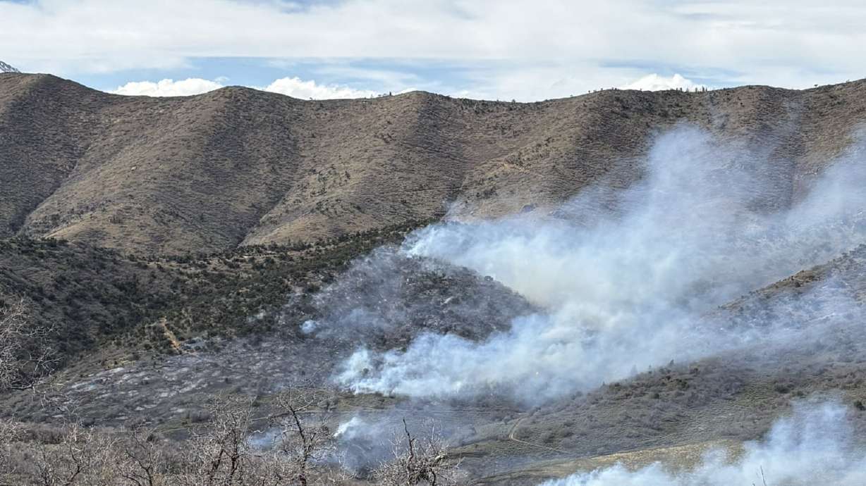 Firefighters are battling the Hop Fire in Juab County, fire officials said Friday.