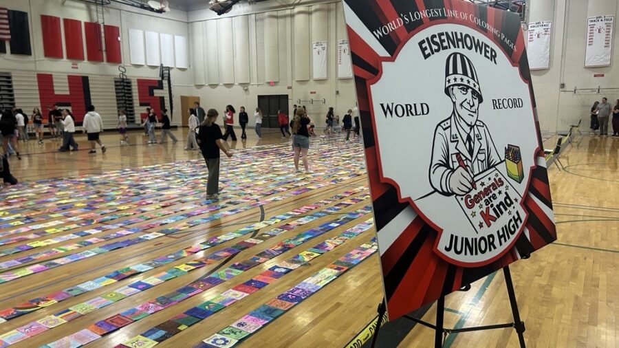 Eisenhower Junior High students attempt world record for longest line of coloring pages