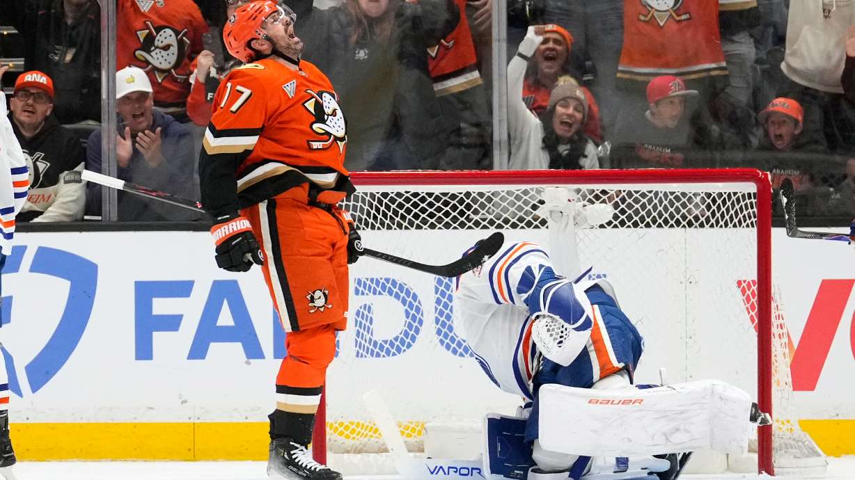 Anaheim Ducks left wing Alex Killorn, left, celebrates his goal as Edmonton Oilers goaltender Connor Ingram sits in goal during the second period of Game 3 in the first round of the NHL hockey Stanley Cup playoffs series Friday, April 24, 2026, in Anaheim, Calif.