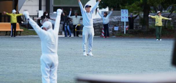 Japan awakens to Radio Taiso exercise tradition. One face of the country's longevity