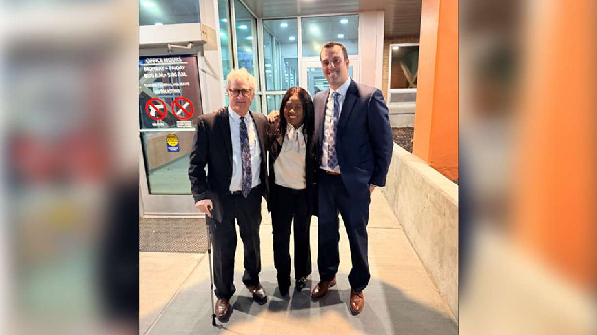 Chanica Sintima stands with her legal team by an entrance to the Bannock County Courthouse. A jury has ruled in favor of the former Idaho State University student for retaliating against her based on her race.