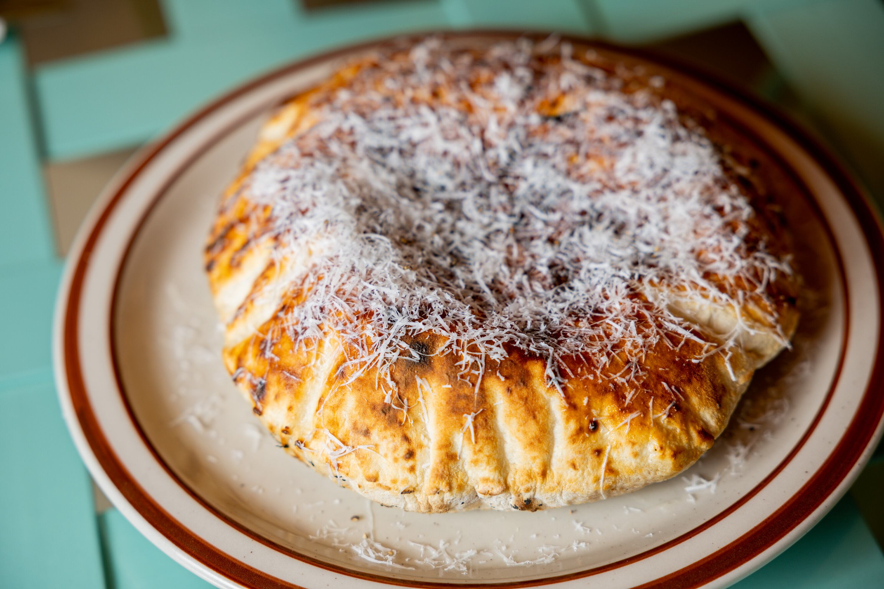 The house puffy bread at Cosmica in Salt Lake City on April 15. Co-owner and chef Zach Wade described the restaurant as "Italian diner meets spaghetti Western."