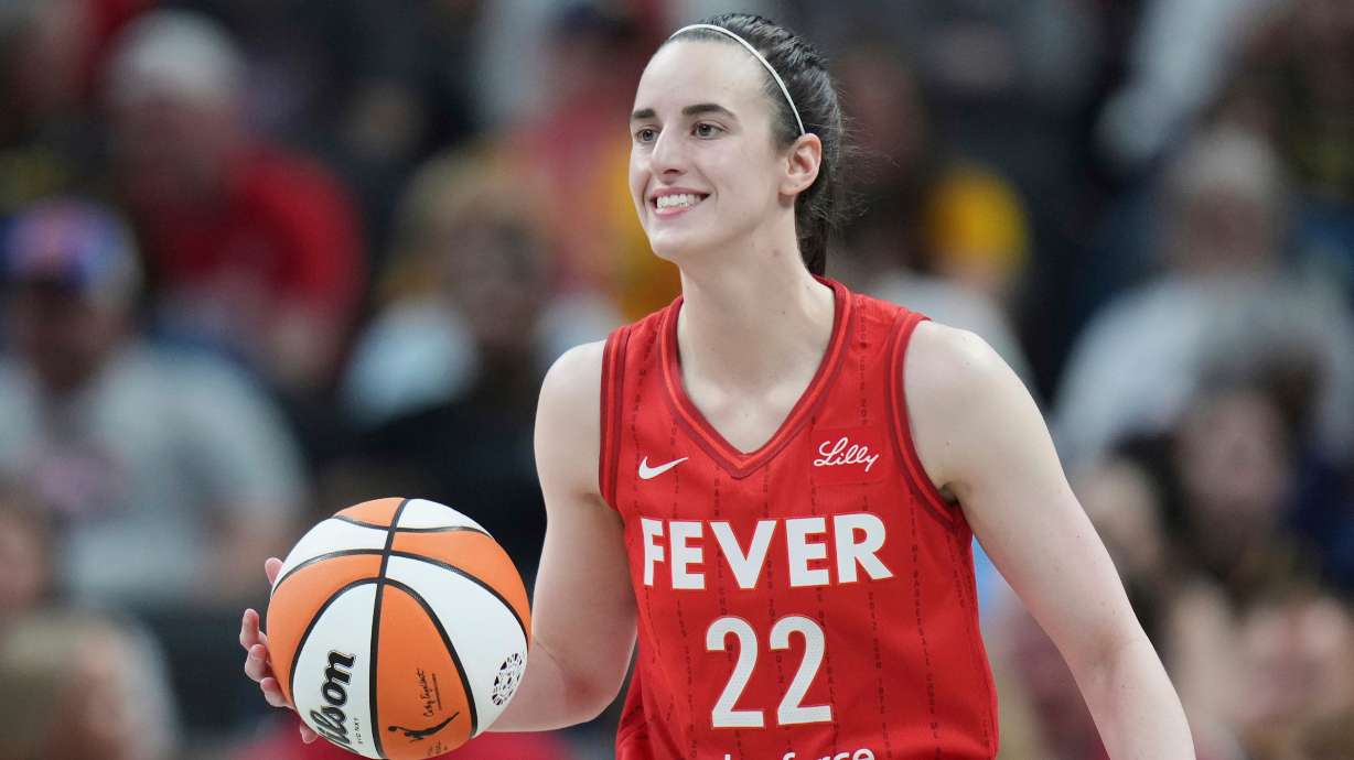 FILE - Indiana Fever guard Caitlin Clark (22) in action during a WNBA basketball game against the Chicago Sky in Indianapolis, May 17, 2025.