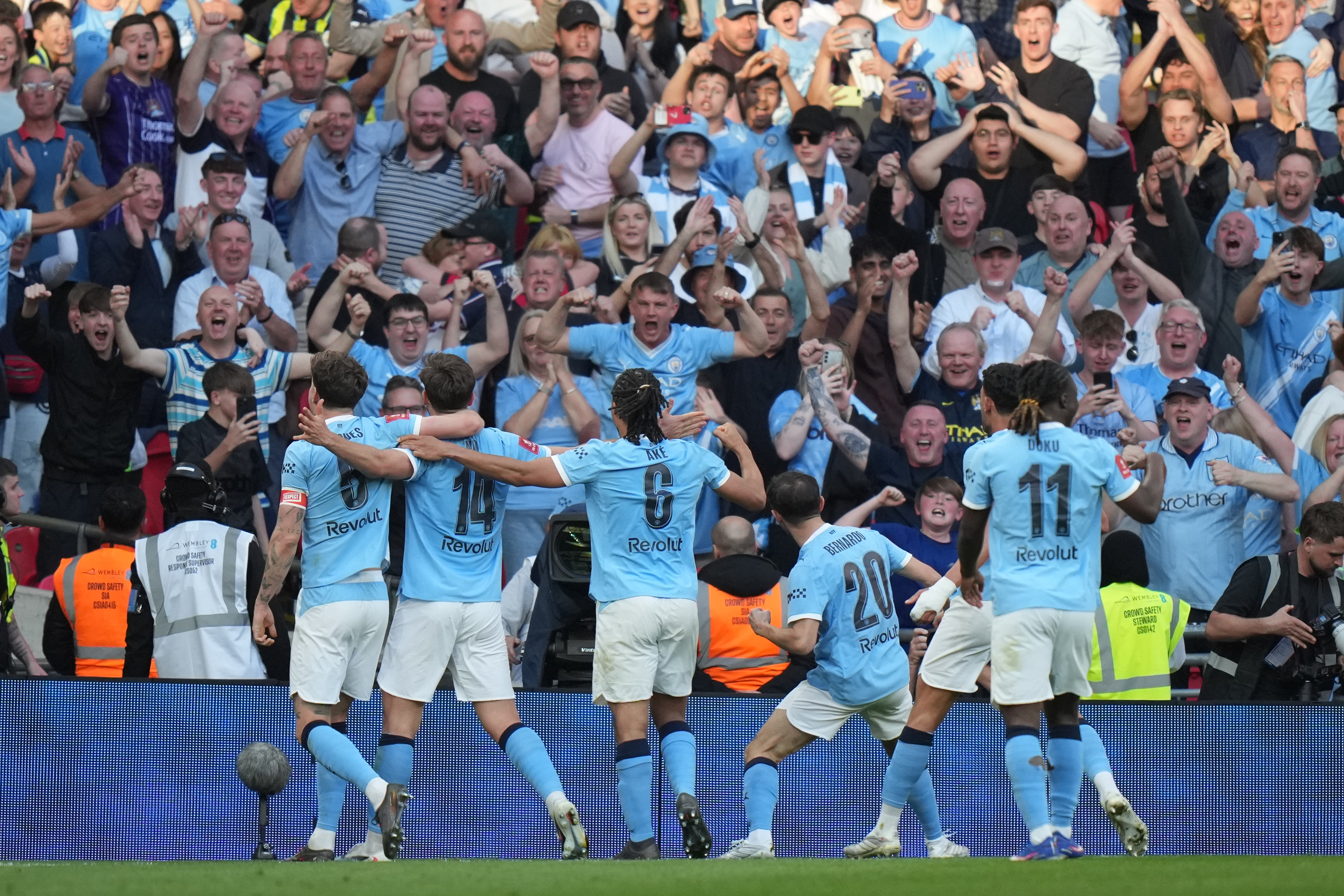Manchester City players celebrate after scoring during the FA Cup semifinal soccer match between Manchester City and Southampton in Manchester, England, Saturday, April 25, 2026. 