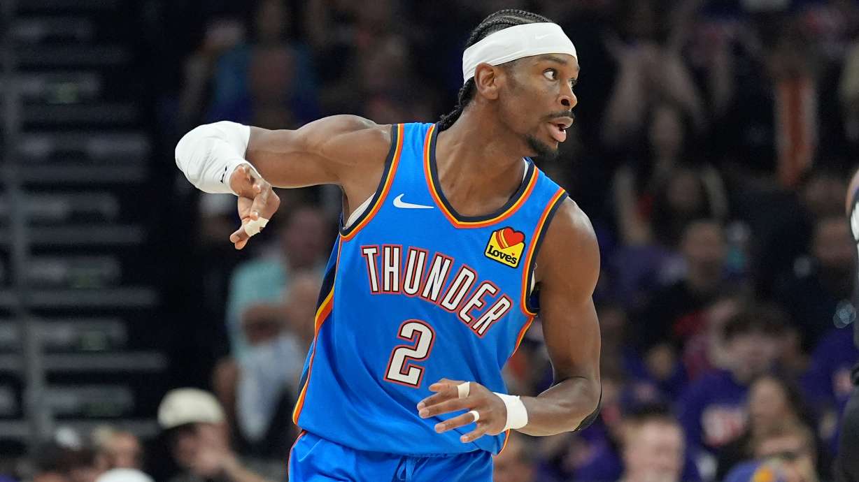 Oklahoma City Thunder guard Shai Gilgeous-Alexander celebrates a 3-pointer against the Phoenix Suns during the first half of Game 3 of a first-round NBA playoffs basketball series, Saturday, April 25, 2026, in Phoenix.