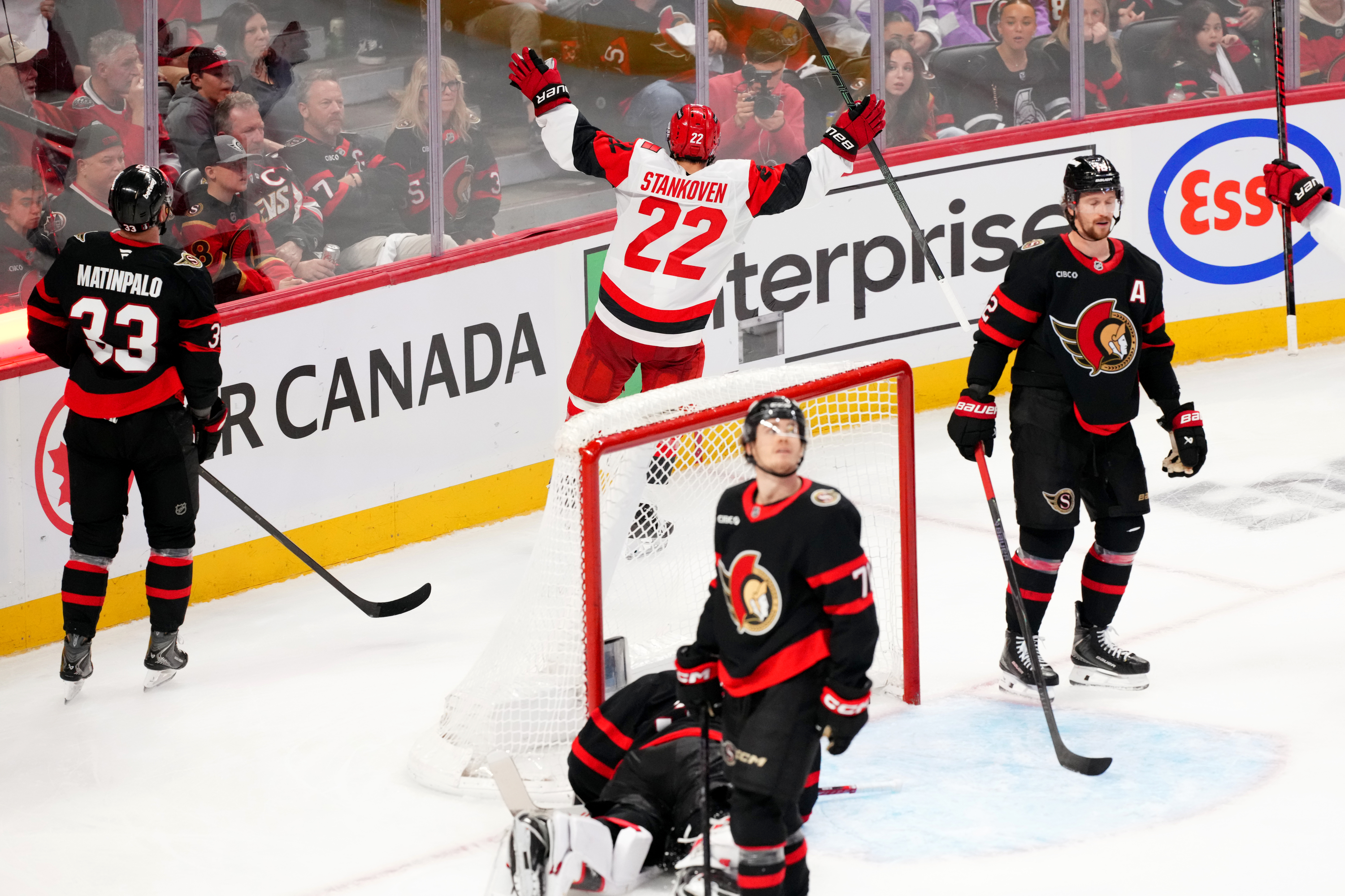 Carolina Hurricanes centre Logan Stankoven (22) celebrates his goal past Ottawa Senators goaltender Linus Ullmark (35) during the third period in Game 4 of a first-round NHL Stanley Cup playoff hockey series, Saturday, April 25, 2026, in Ottawa, Ontario. 