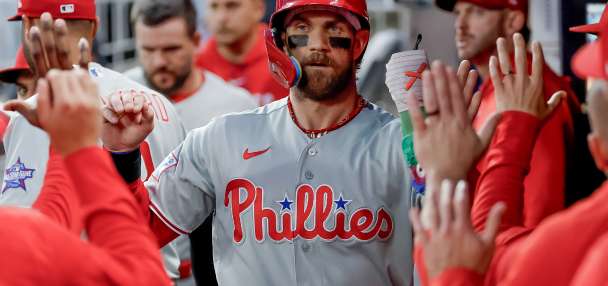 Bryce Harper leads Phillies past Braves 8-5 in 10 innings to stop 10-game losing streak