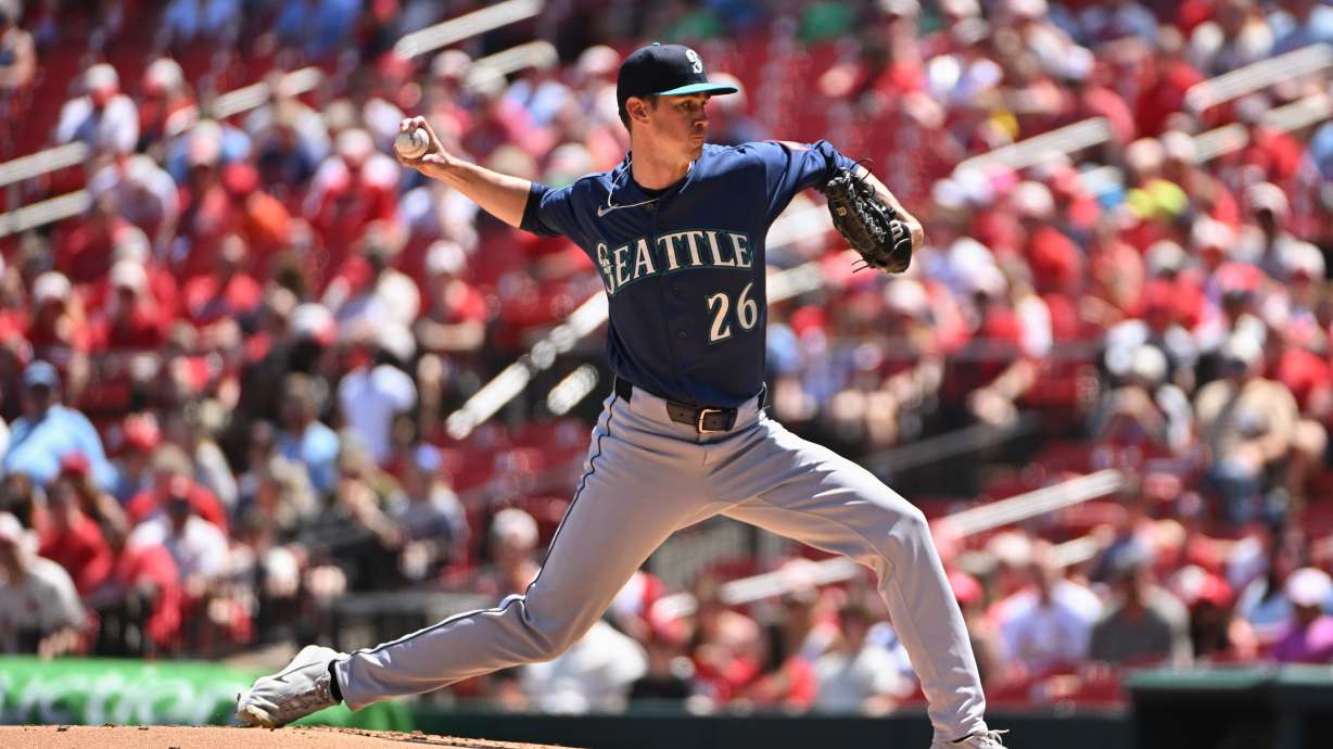 Seattle Mariners pitcher Emerson Hancock delivers against the St. Louis Cardinals during the first inning of a baseball game, Sunday, April 26, 2026, in St. Louis.
