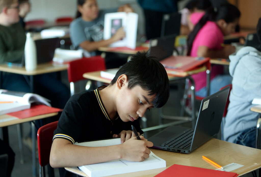 Honorio Almazan works on math at Northwest Middle School in Salt Lake City on Sept. 12, 2024. Northwest Middle School Principal Andrea Seminario has reduced the school's chronic absence rate to 12-13%, which is half the state average.