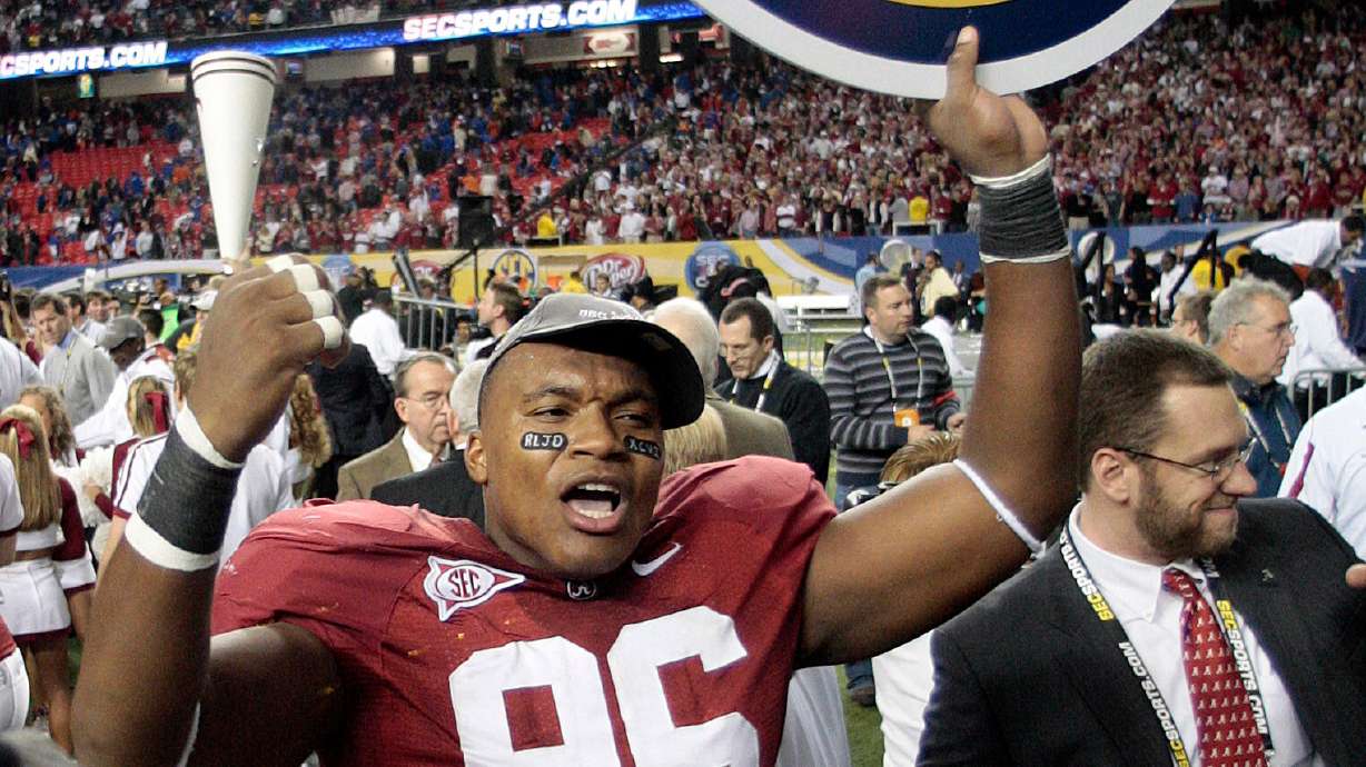 FILE - Alabama's Luther Davis (96) reacts after their 32-13 win over Florida in the SEC championship NCAA college football game at the Georgia Dome in Atlanta, Dec. 5, 2009.