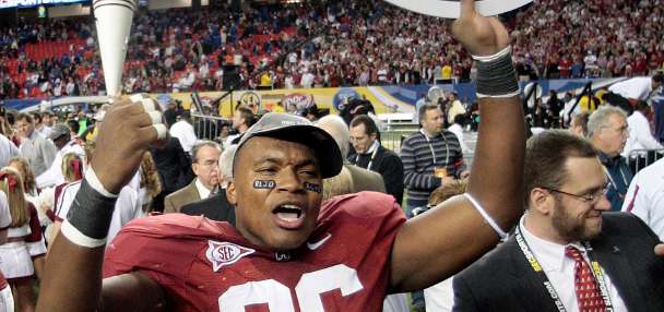 Former Alabama tackle pleads guilty to defrauding investors using wigs to impersonate NFL players