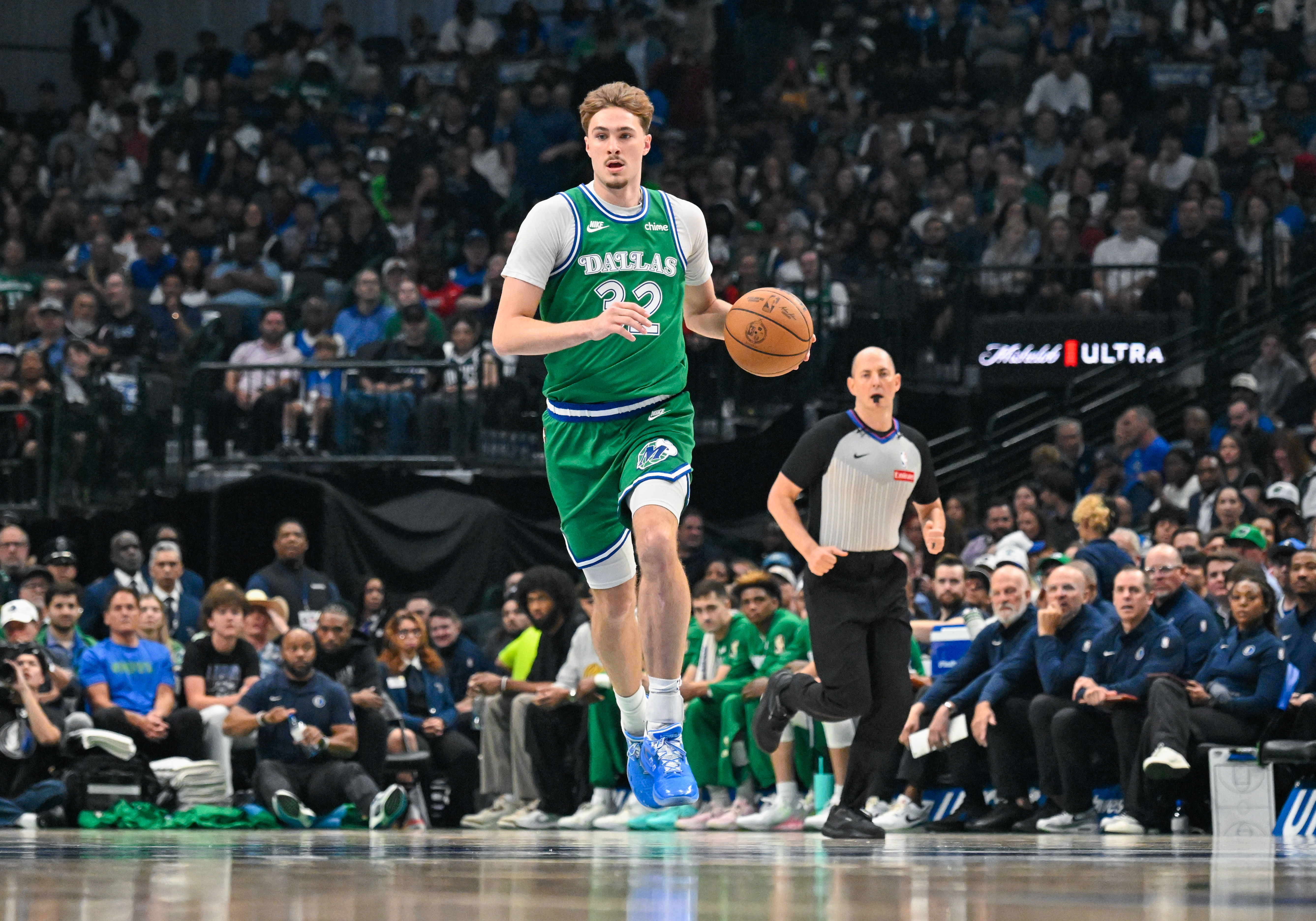 Dallas Mavericks' Cooper Flagg brings the ball up court during an NBA basketball game against the Chicago Bulls Sunday, April 12, 2026, in Dallas. 