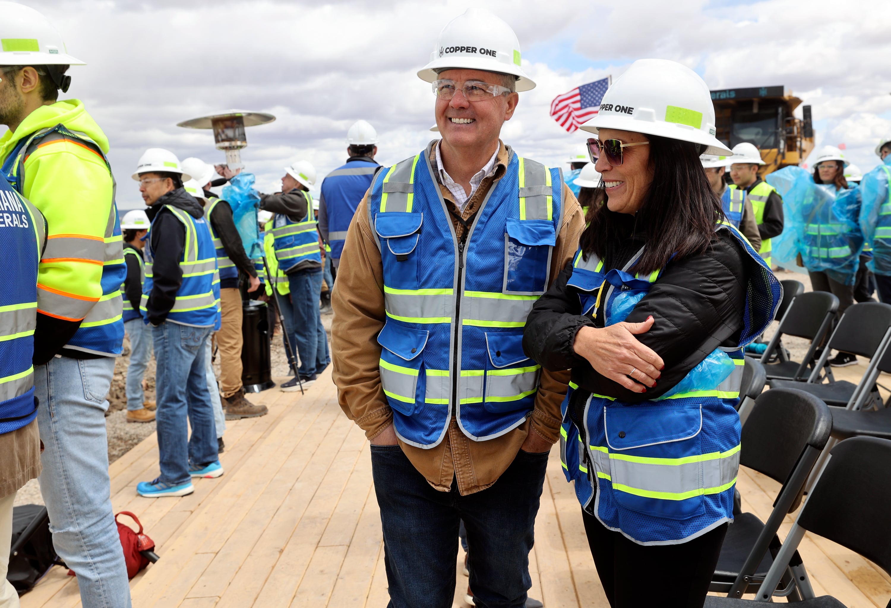 Joel Brown, Eastern Utah director for Sen. Mike Lee, and San Juan County commissioner Lori Maughan talk at an event to mark the reopening of Mariana Minerals’ Copper One mine in San Juan County on Monday. The mine will use autonomous tools for mining, refining and capital project execution.
