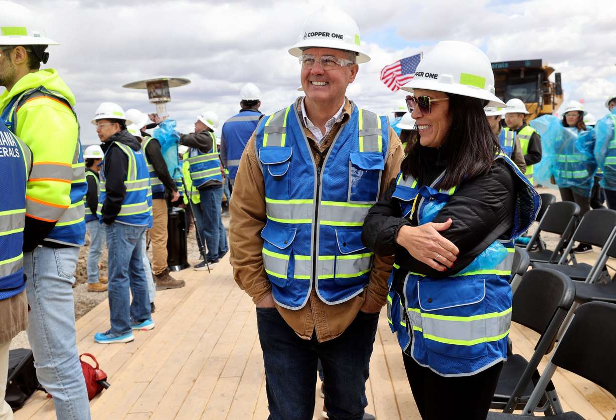 Joel Brown, Eastern Utah director for Sen. Mike Lee, and San Juan County commissioner Lori Maughan talk at an event to mark the reopening of Mariana Minerals’ Copper One mine in San Juan County on Monday. The mine will use autonomous tools for mining, refining and capital project execution.