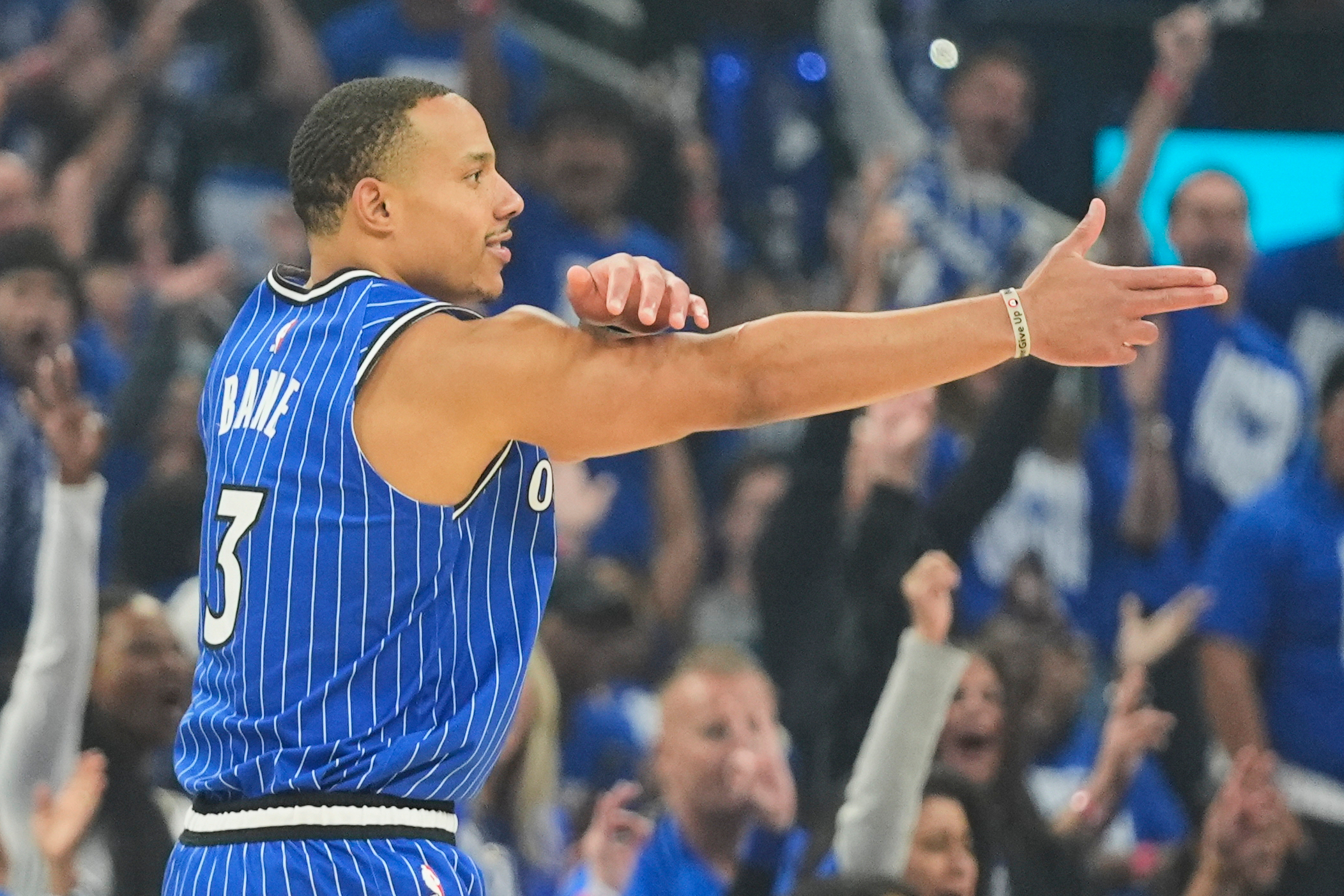 Orlando Magic guard Desmond Bane (3) points to teammates after sinking a 3-point shot against the Detroit Pistons during the first half in Game 4 of a first-round NBA basketball playoff series, Monday, April 27, 2026, in Orlando, Fla. 