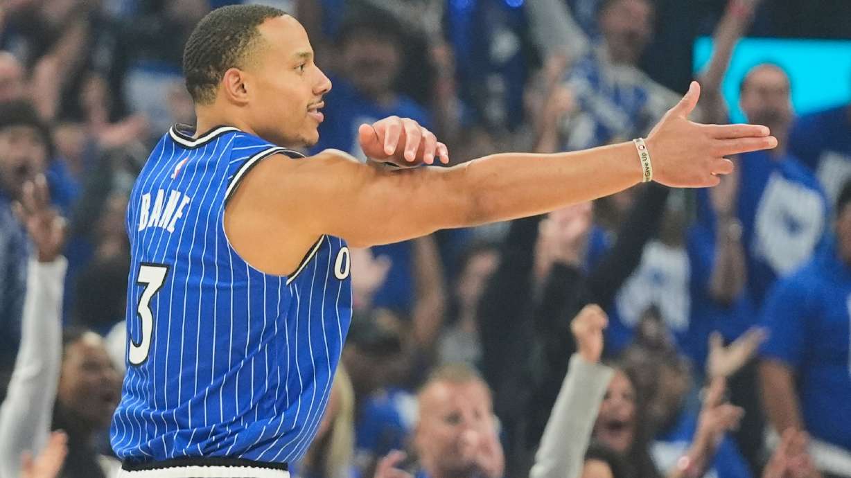 Orlando Magic guard Desmond Bane (3) points to teammates after sinking a 3-point shot against the Detroit Pistons during the first half in Game 4 of a first-round NBA basketball playoff series, Monday, April 27, 2026, in Orlando, Fla.