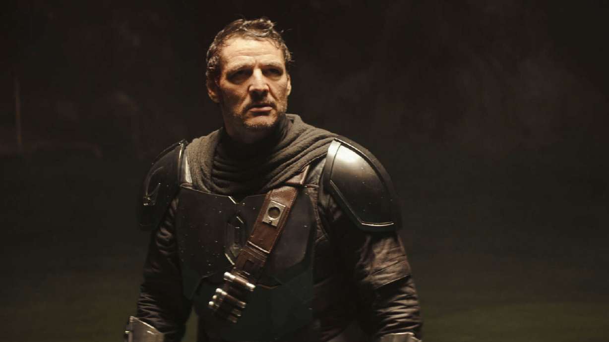The Mandalorian, portrayed by Pedro Pascal in a scene from Lucasfilm's "Star Wars: The Mandalorian and Grogu."