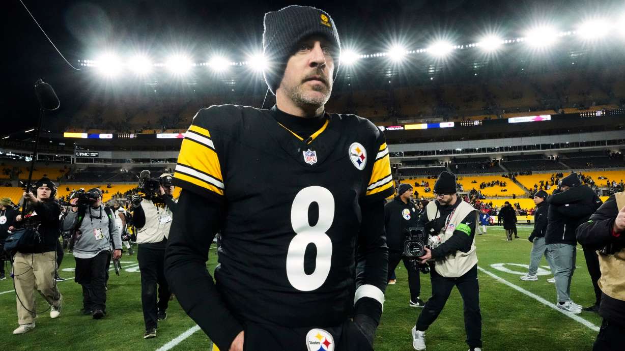 FILE - Pittsburgh Steelers quarterback Aaron Rodgers (8) leaves the field after an NFL wild-card playoff football game against the Houston Texans, Monday, Jan. 12, 2026, in Pittsburgh.
