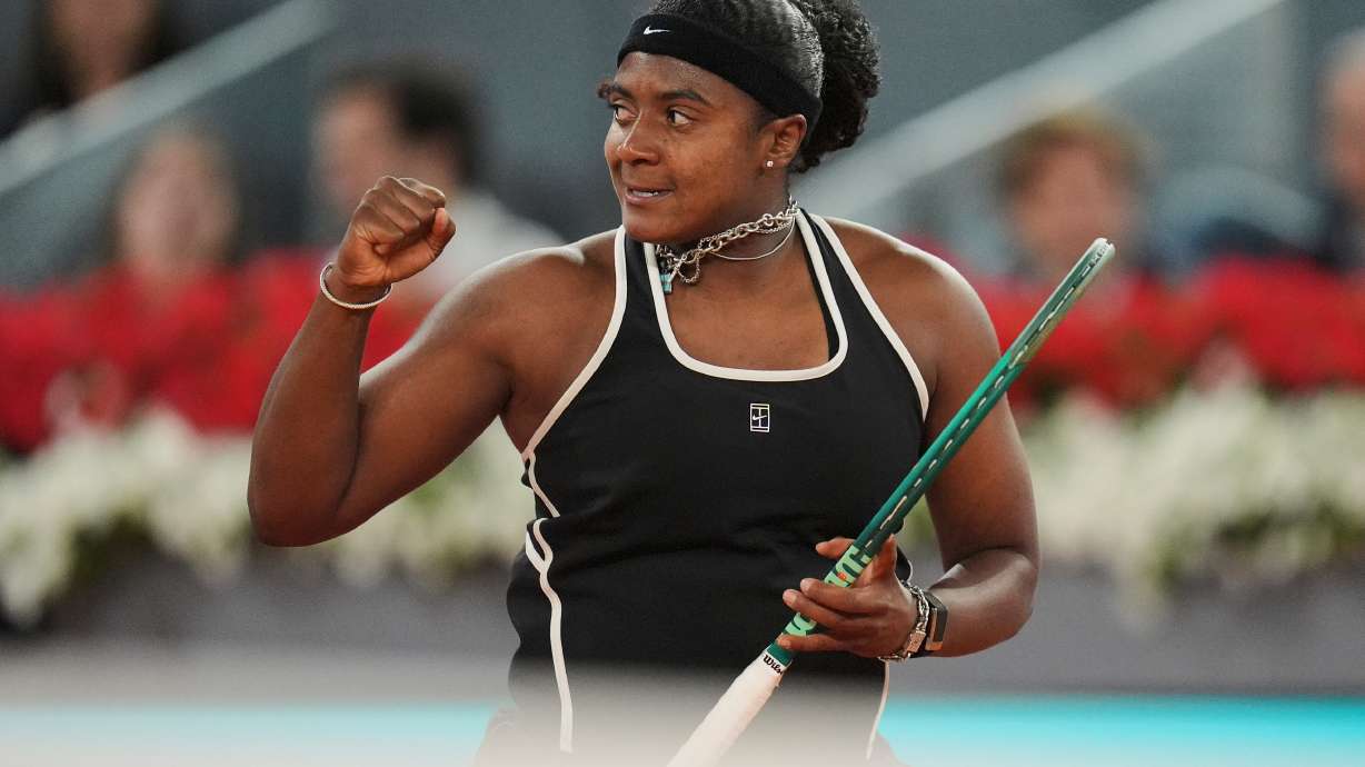 Hailey Baptiste, of the United States, celebrates a point during her match against Aryna Sabalenka, of Belarus, at the Madrid Open tennis tournament in Madrid, Tuesday, April 28, 2026.