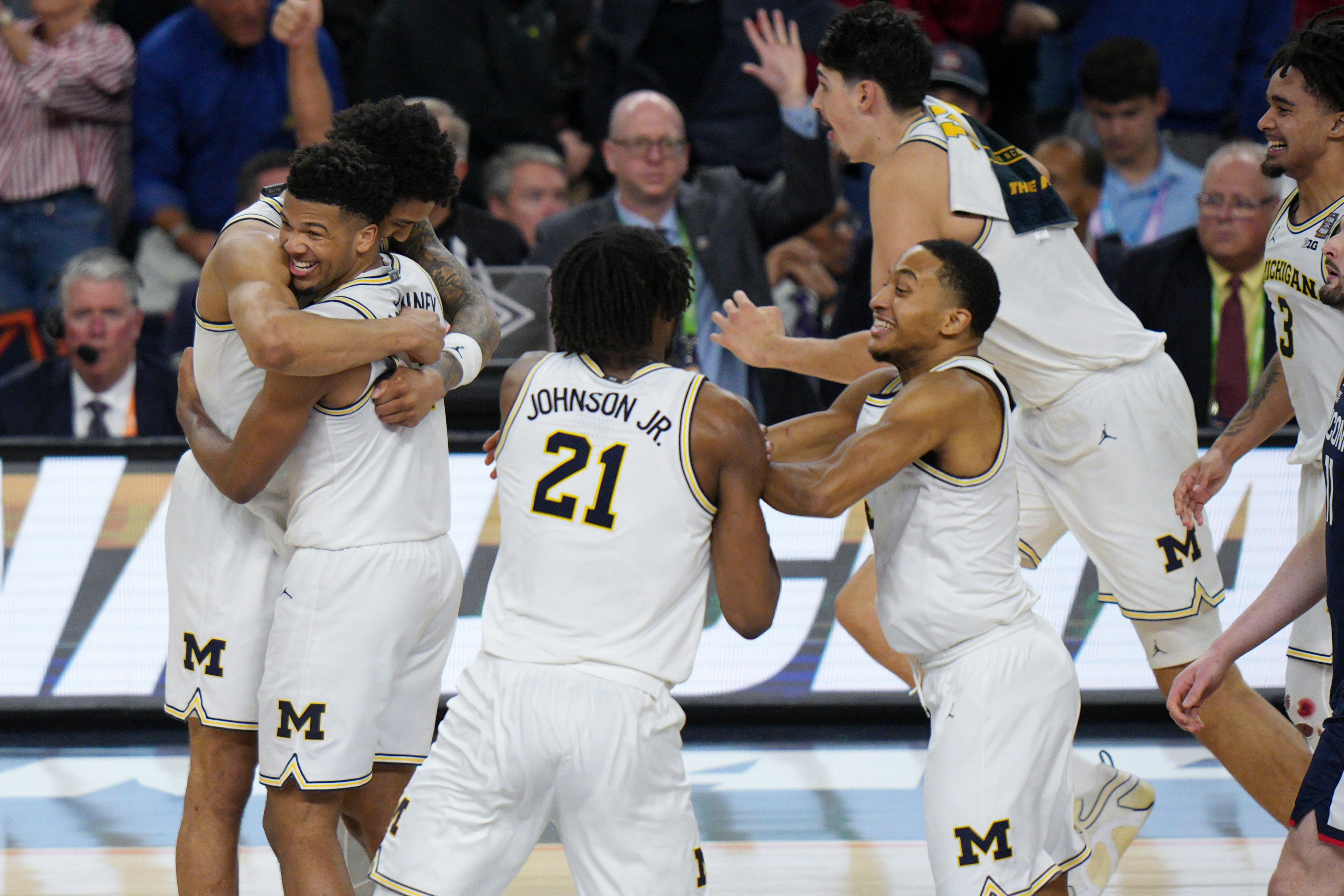 Michigan celebrates after defeating UConn in the NCAA college basketball tournament national championship game at the Final Four, Monday, April 6, 2026, in Indianapolis.
