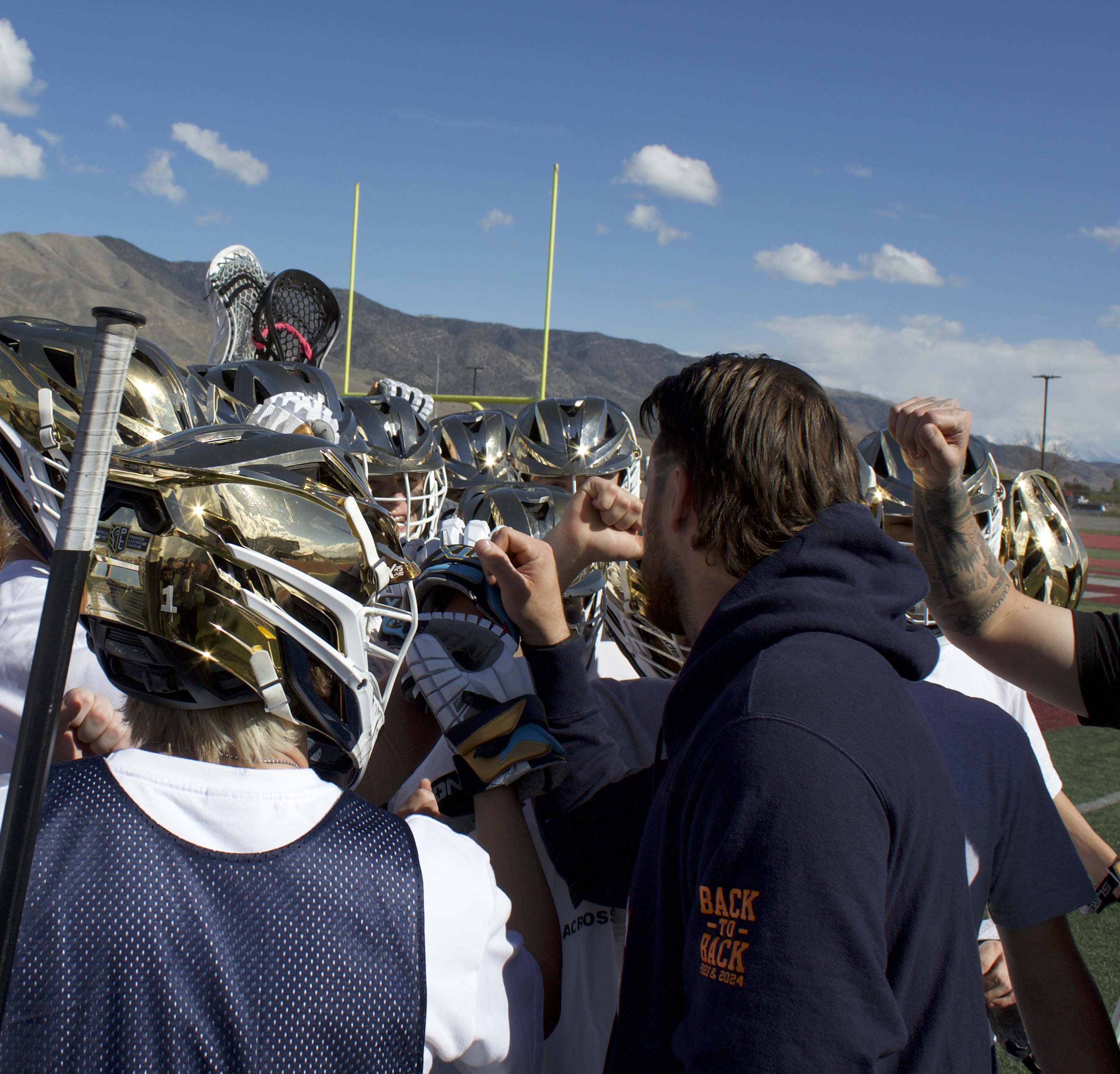 Utah Archers goalie Brett Dobson meets with players, fans and fellow lacrosse junkies before the high school game between Cedar Valley and Westlake, Tuesday, April 28, 2026, in Eagle Mountain, Utah.