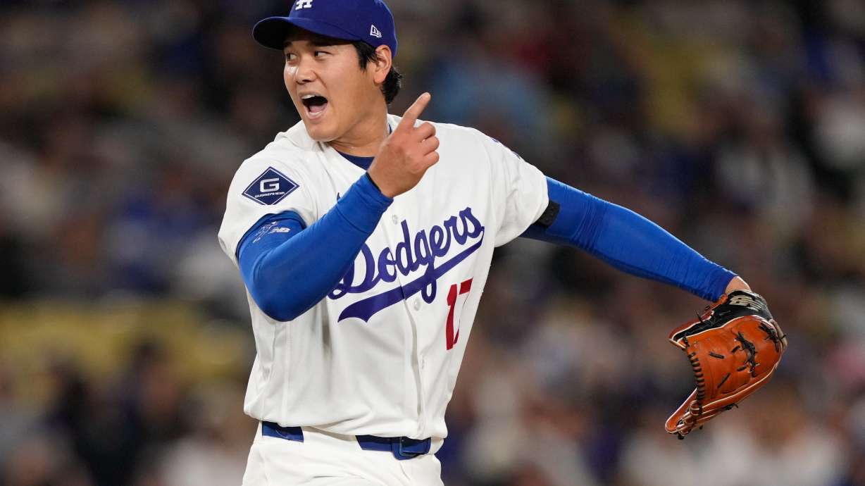 Los Angeles Dodgers starting pitcher Shohei Ohtani reacts after striking out Miami Marlins' Agustin Ramirez during the fifth inning of a baseball game Tuesday, April 28, 2026, in Los Angeles.